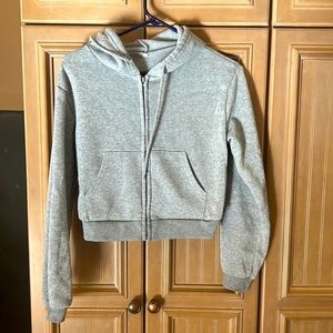 I am selling a barely worn cropped grey hoodie from shein
